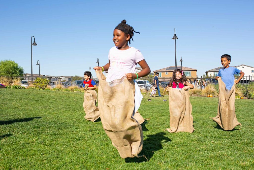 Potato sack races at the Tracy Hills Fall Celebration